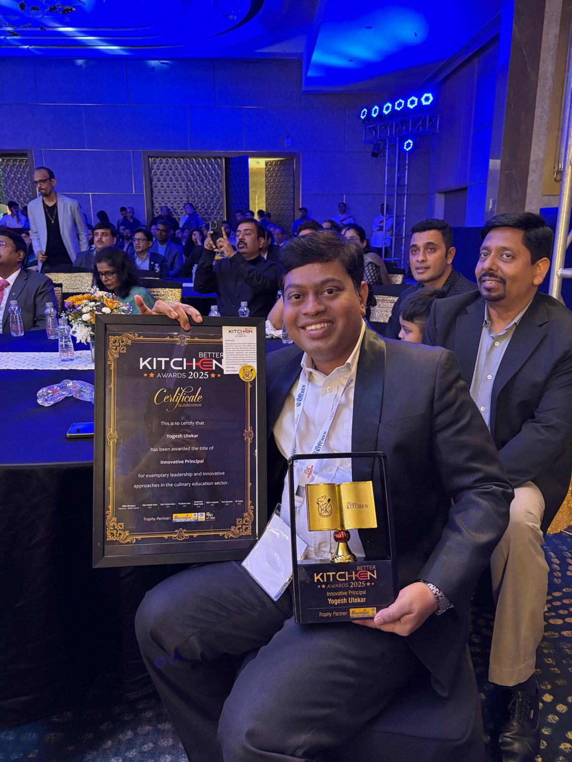 Chef Yogesh Utekar with the Innovative Principal 2025 certificate and trophy at Better Kitchen Awards